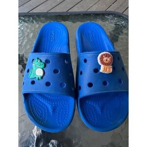 Crocs Kids Blue Slide Sandals with Lion and Dinosaur Charms